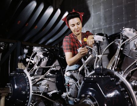 774px-Woman_working_on_an_airplane_motor_at_North_American_Aviation,_Inc.,_plant_in_Calif